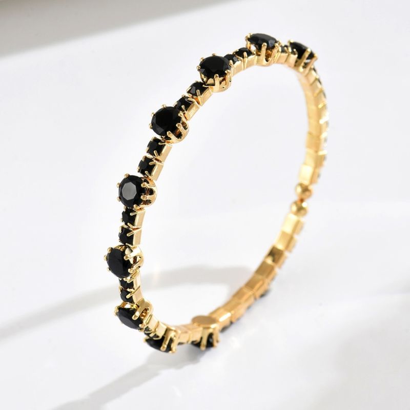 Endless armbånd med sorte sirkel stener